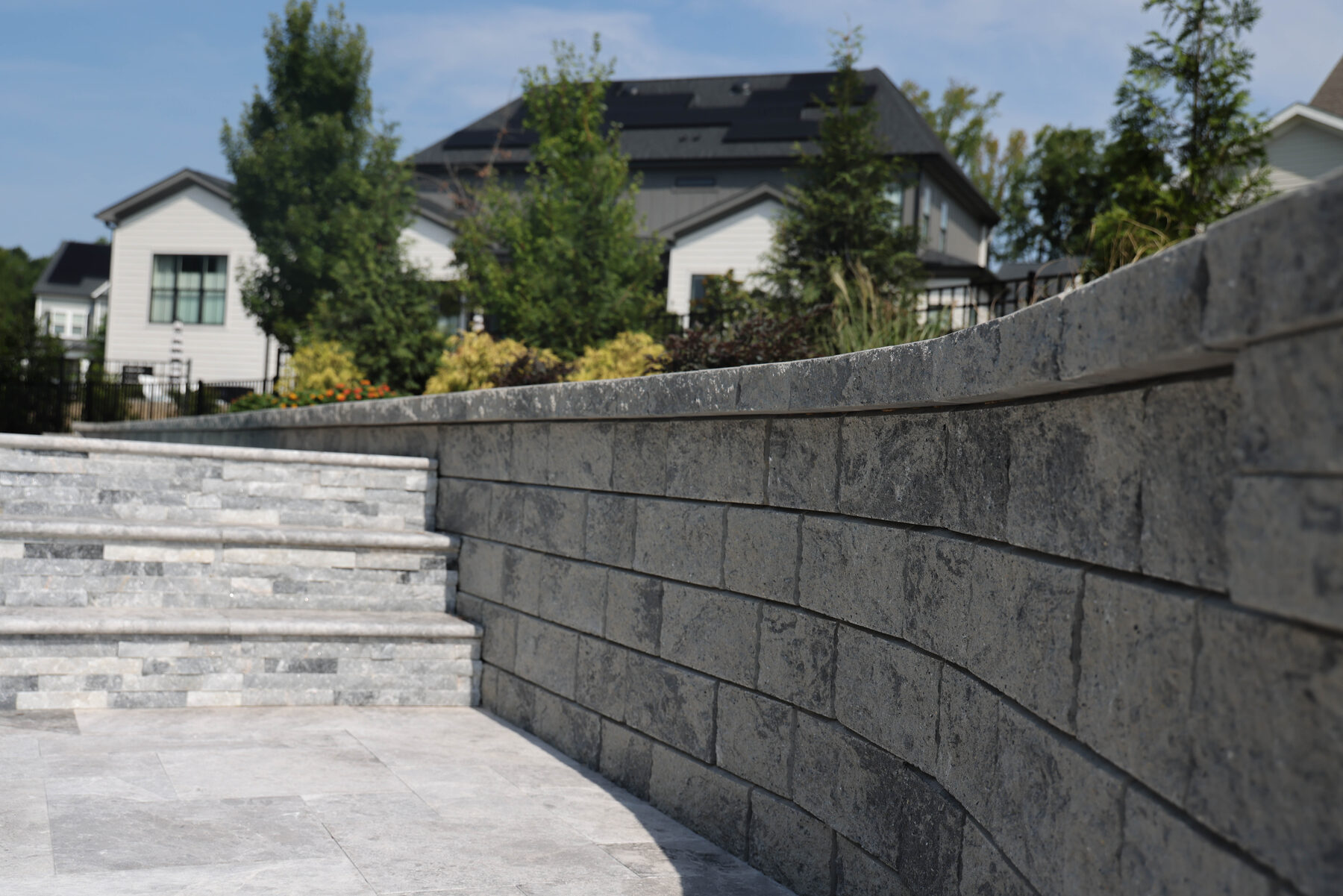 Curved retaining wall in grey block