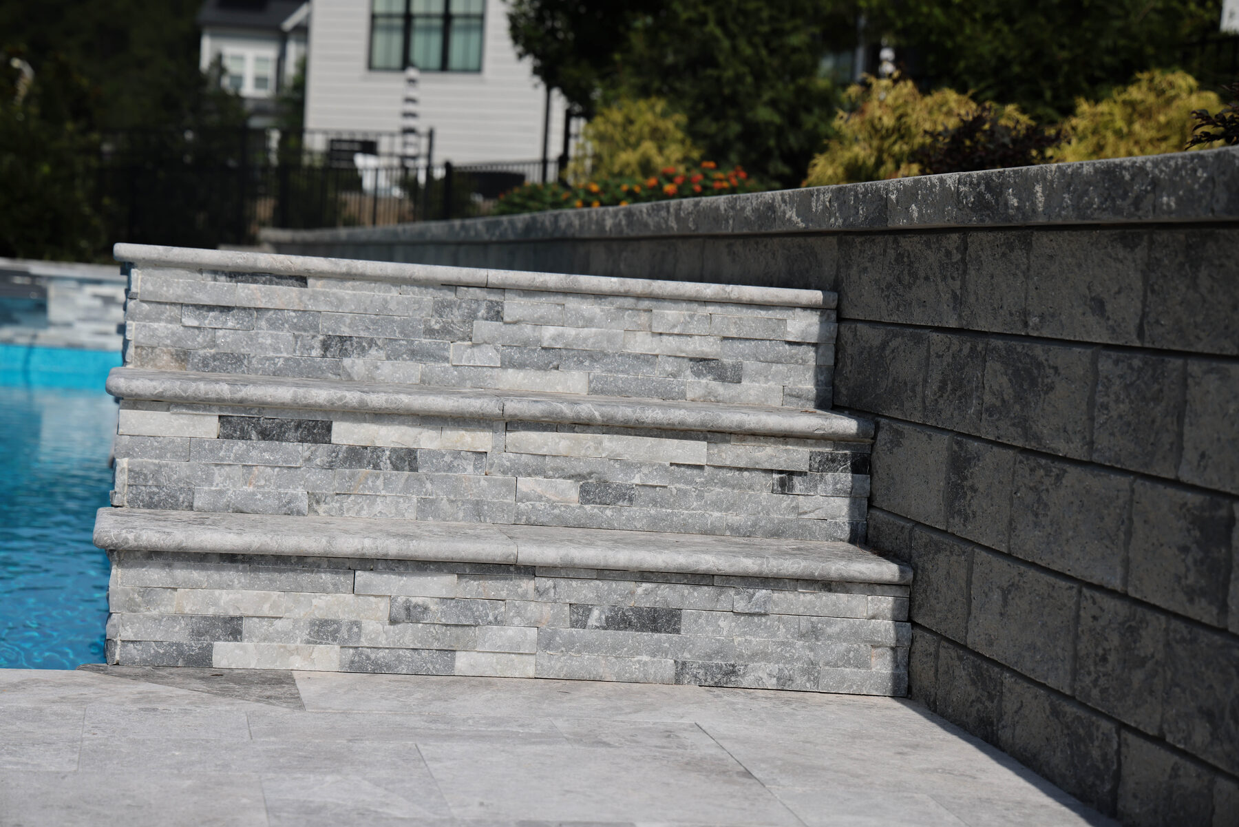 Stacked stone steps and raised wall
