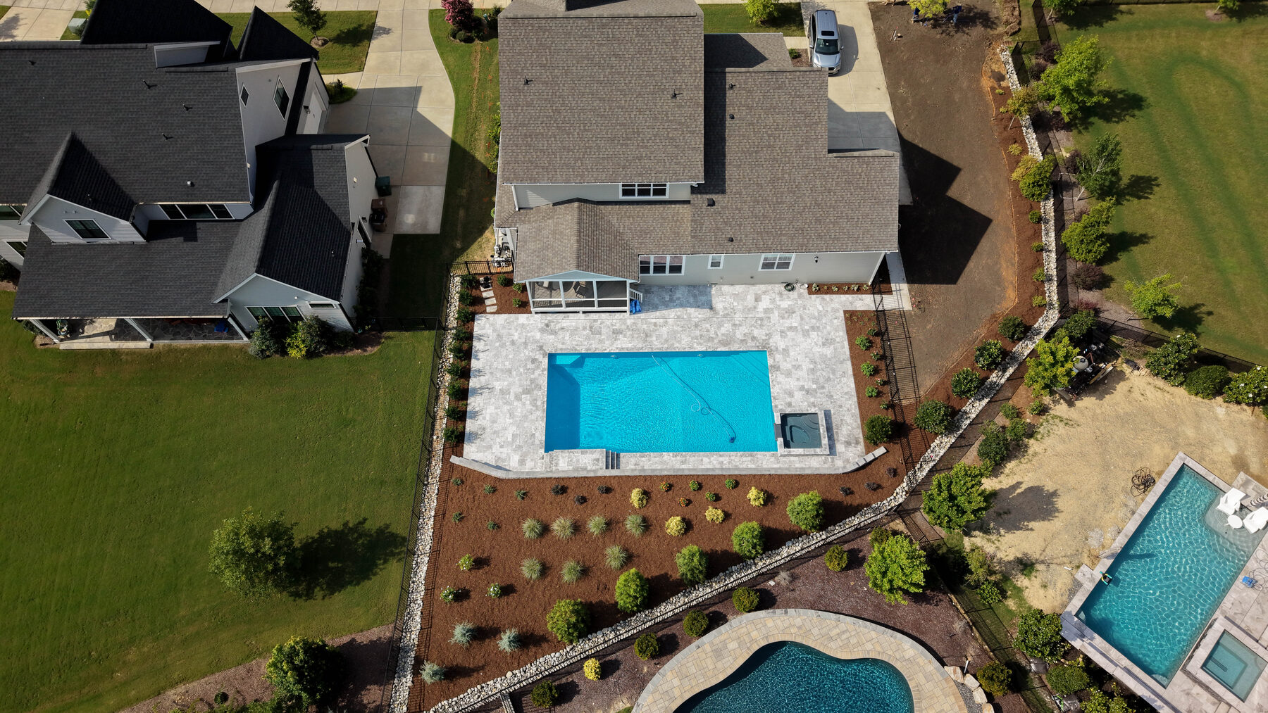Aerial of pool, patio and plantings