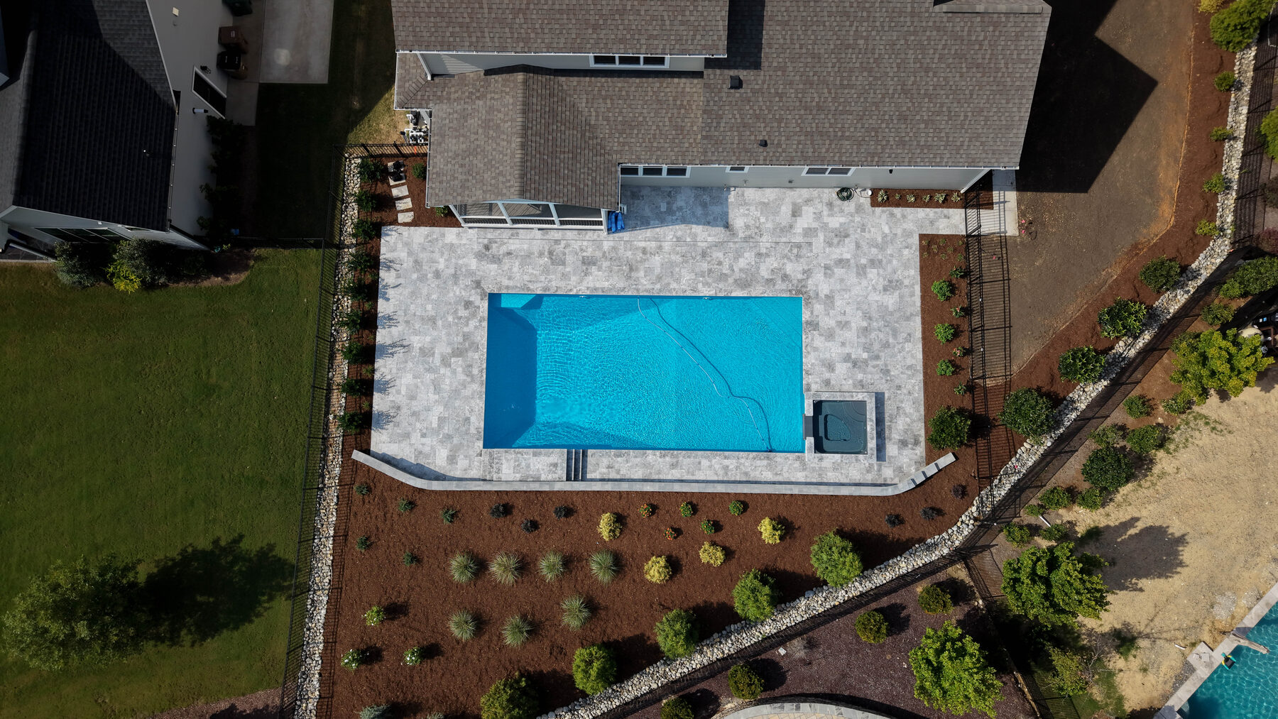 Overhead of pool deck and coping