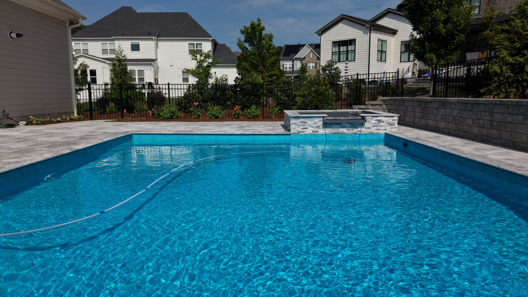 Pool with wide stone deck