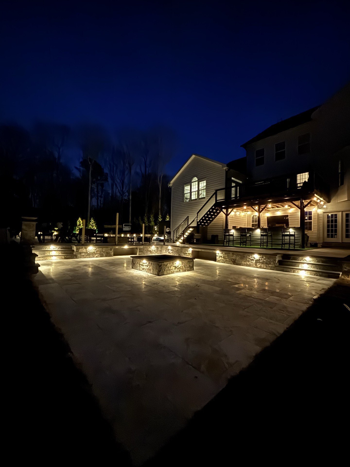 Night patio with outdoor lighting