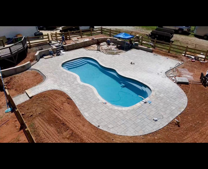 Aerial drone shot of freeform pool